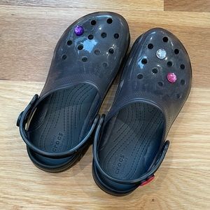Crocs classic black translucent clogs with jibbitz